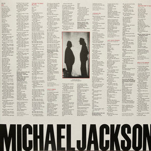 Back cover of Michael Jackson Bad vinyl record featuring song lyrics, a black-and-white silhouette photo, and bold typography.