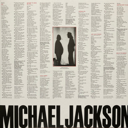 Back cover of Michael Jackson Bad vinyl record featuring song lyrics, a black-and-white silhouette photo, and bold typography.