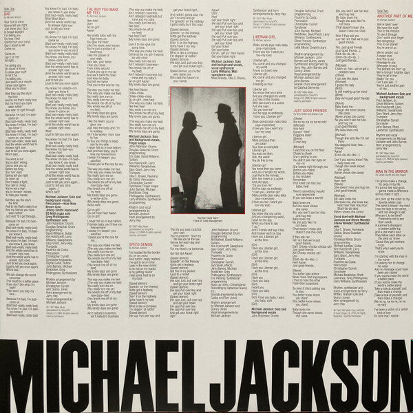 Back cover of Michael Jackson Bad vinyl record featuring song lyrics, a black-and-white silhouette photo, and bold typography.
