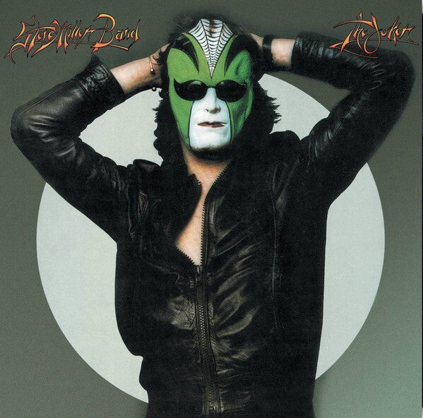 Vinyl album cover featuring a person in a black leather jacket with green face paint and sunglasses.