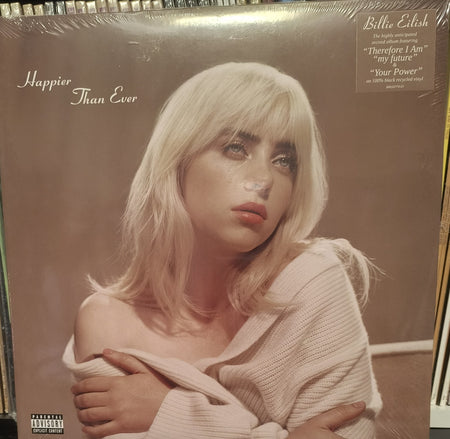 Billie Eilish Happier Than Ever vinyl record album cover with moody portrait and beige sweater.