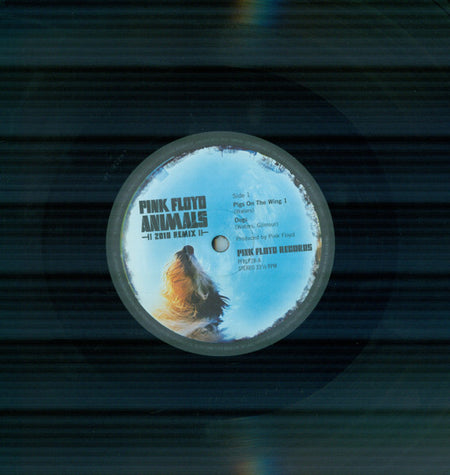 Pink Floyd Animals 2018 Remix vinyl record with illustrated animal label and tracklist text