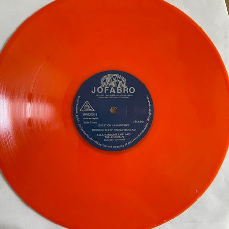 Bright orange vinyl record with blue Jofabro label, classic album for music collectors