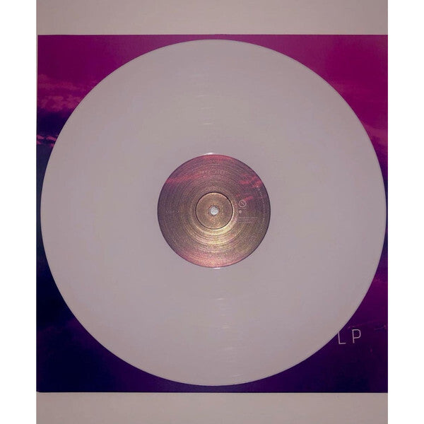 White vinyl record on purple and pink album cover, collectible music LP