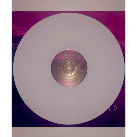 White vinyl record on purple and pink album cover, collectible music LP