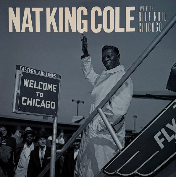 Nat King Cole vinyl album cover, vintage photo, Welcome to Chicago airport sign, jazz music
