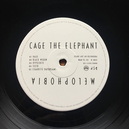 Cage The Elephant Melophobia vinyl record label with tracklist in black and white, close-up shot