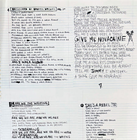 Handwritten song lyrics for Green Day tracks including Boulevard of Broken Dreams and Give Me Novacaine, displayed on lined paper.