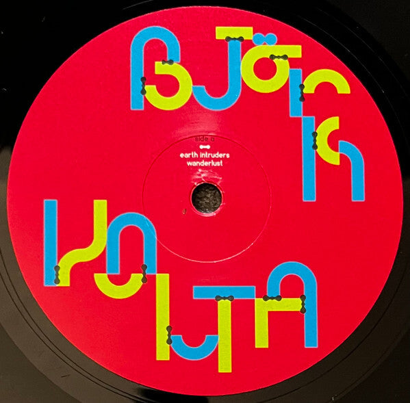Colorful Björk Volta vinyl record with red label, featuring album and song titles.