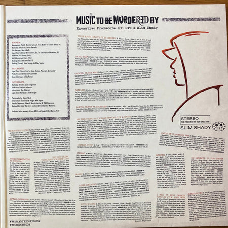 Tracklist and song credits of 'Music To Be Murdered By' vinyl album with hooded figure illustration.