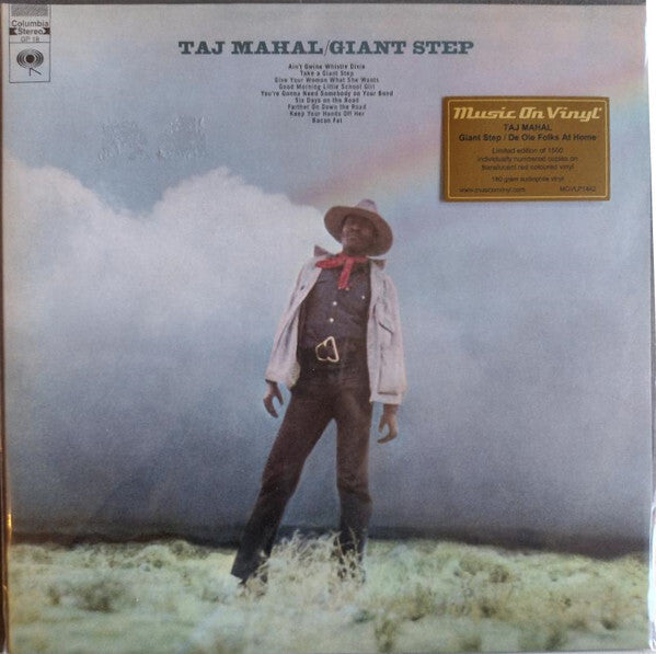 Taj Mahal Giant Step vinyl album cover featuring man in cowboy attire standing in a field under a rainbow.