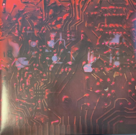 Close-up of electronic circuit board with red and orange lighting, abstract pattern