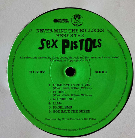 Green vinyl record label for Sex Pistols 'Never Mind the Bollocks', Side 1 tracklist visible.