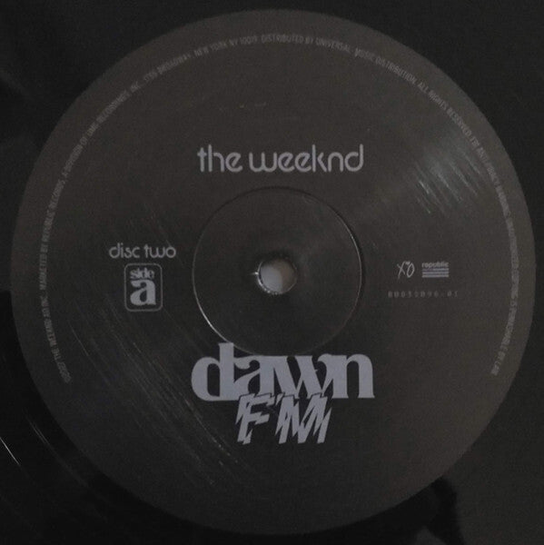 The Weeknd Dawn FM vinyl record disc two side A close-up, black label with white text.