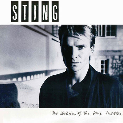 Black and white vinyl album cover featuring a man standing outdoors with bold text and handwritten title.