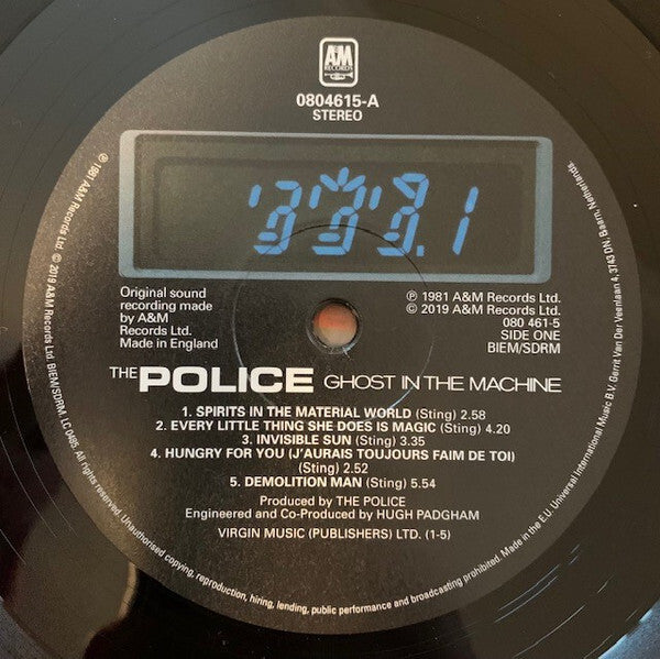 The Police Ghost in the Machine vinyl record label with tracklist and digital display graphic.
