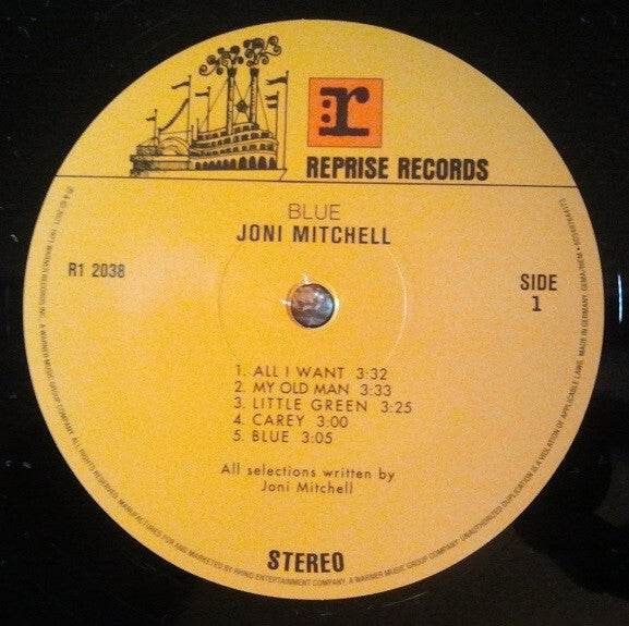 Close-up of Joni Mitchell Blue vinyl record label, Reprise Records, tracklist side 1 visible