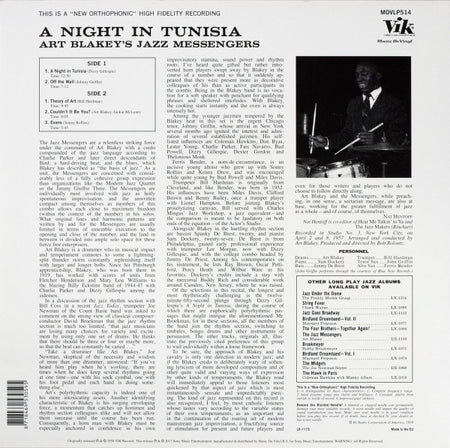Back cover of Art Blakey's Jazz Messengers album 'A Night in Tunisia' with tracklist, album details, and black and white photo of musician playing drums.
