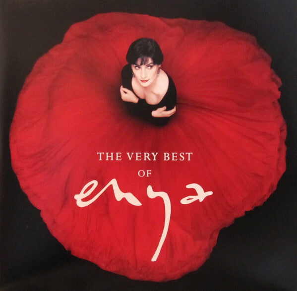 The Very Best of Enya album cover, woman in red dress, vinyl record music collection