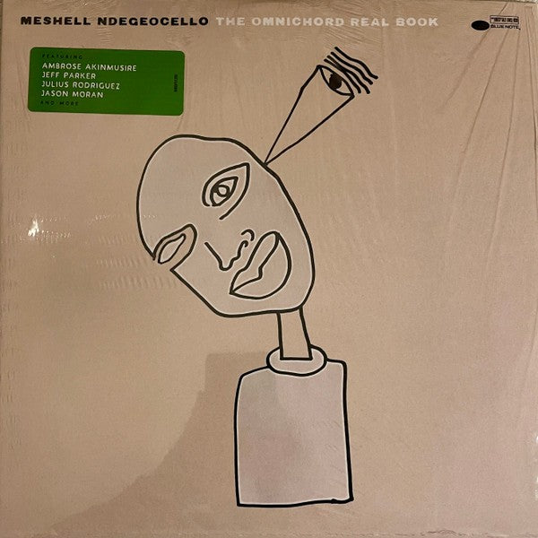 The Omnichord Real Book vinyl album cover with abstract line art face and featured artists sticker