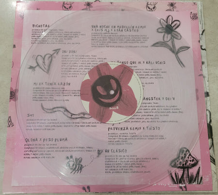 Clear vinyl record with pink smiling flower label on illustrated pink sleeve featuring handwritten song titles and doodles.
