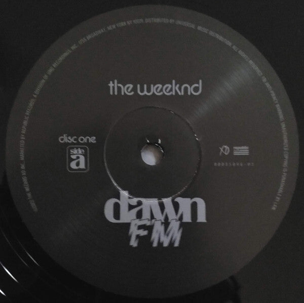 Close-up of The Weeknd Dawn FM vinyl record, disc one, side A label