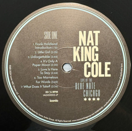 Nat King Cole vinyl record label for 'Live at the Blue Note Chicago,' tracklist shown.