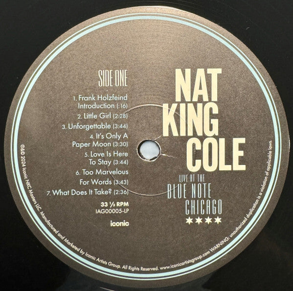 Nat King Cole vinyl record label for 'Live at the Blue Note Chicago,' tracklist shown.