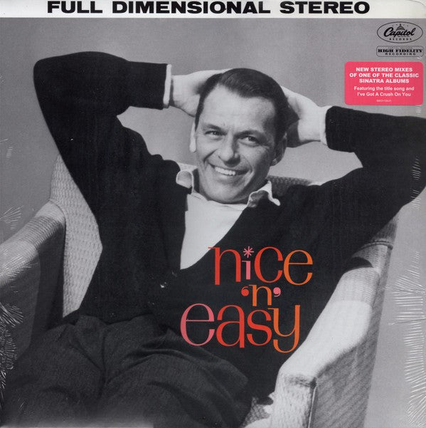 Black and white vinyl record cover of Nice 'n' Easy featuring a smiling man in an armchair.