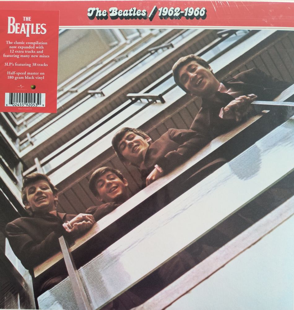 The Beatles 1962-1966 vinyl album cover featuring band members leaning on a balcony.